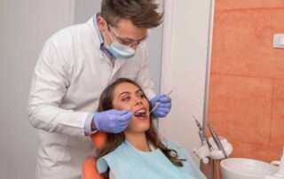 Eaxamining a patient with Dentophobia